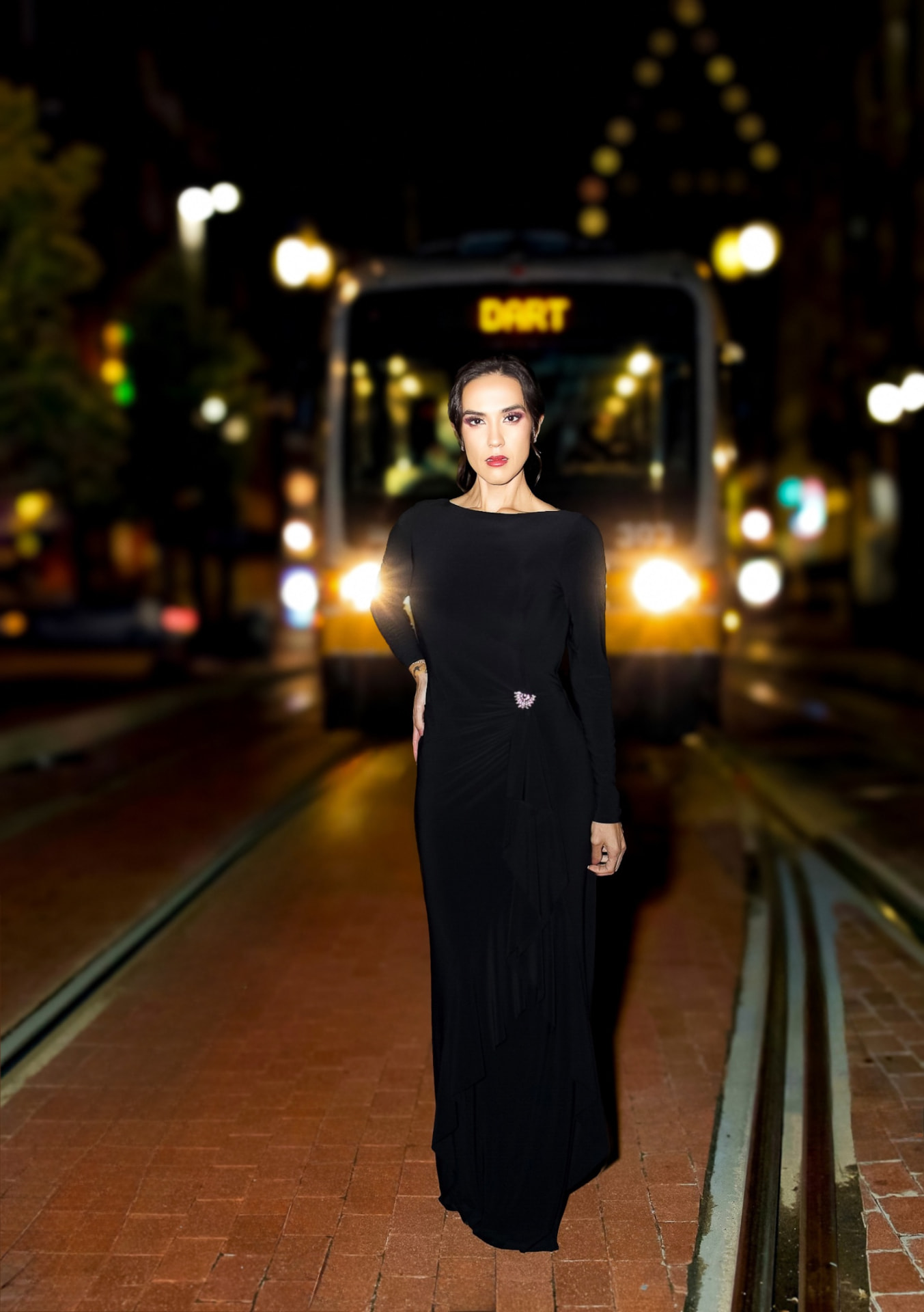 AI portrait of Dani in a black outfit in front of a DART train at night.